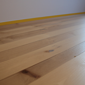 comment se pose le parquet massif
